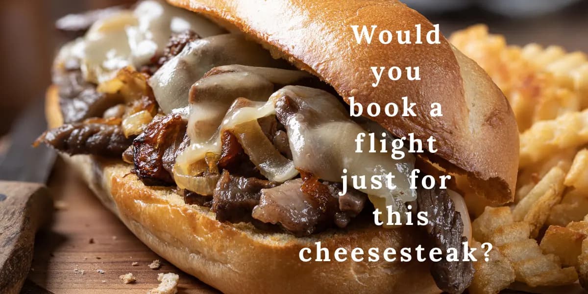 philly-cheesesteak-with-cheese-whiz-being-assembled-on-a-flat-top-grill-in-South-Philadelphia
